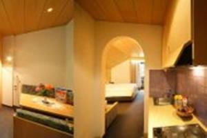 Kuchyňa alebo kuchynka v ubytovaní Hotel Garní Sunnleit´n