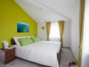 Posteľ alebo postele v izbe v ubytovaní Villa Bea by Interhome