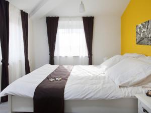 Posteľ alebo postele v izbe v ubytovaní Villa Bea by Interhome