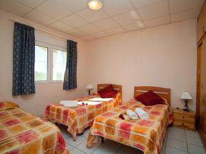 Katil atau katil-katil dalam bilik di Apartment Royal Delta-2 by Interhome +12 gambar