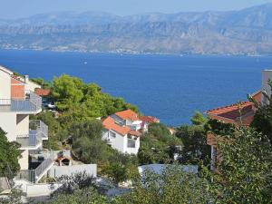 a view of a large body of water with buildings at Apartment Molo Lozna-2 by Interhome in Postira
