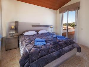 Posteľ alebo postele v izbe v ubytovaní Holiday Home Costabella by Interhome