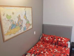 a bedroom with a bed and a map on the wall at Mini Loft Buenavista 106 in Mexico City +21 photos