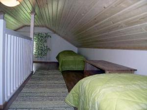 Postel nebo postele na pokoji v ubytování Holiday Home Talvikki by Interhome