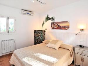 Ένα ή περισσότερα κρεβάτια σε δωμάτιο στο Holiday Home Cofitsa by Interhome