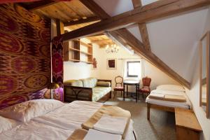 Letto o letti in una camera di Burg Plankenstein