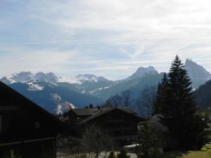 a view of a mountain range with snow covered mountains at Apartment Suzanne Nr- 20 by Interhome in Gstaad