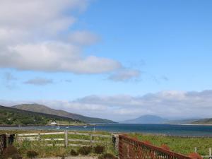 a view of a body of water with mountains at Holiday Home Dunan by Interhome in Dunan