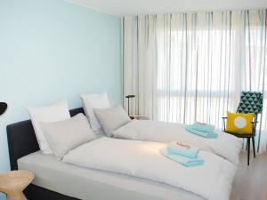 Voodi või voodid majutusasutuse Apartment LaVille B-1-2 by Interhome toas