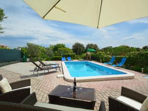 Bazén v ubytovaní Holiday Home Slavko by Interhome alebo v jeho blízkosti