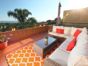 A seating area at Holiday Home Vistamar by Interhome