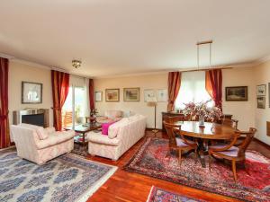 a living room filled with furniture and a table at Villa Bertoni Golf & Sea by Interhome in Reus