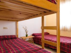 Ein Bett oder Betten in einem Zimmer der Unterkunft Apartment Vista Mar by Interhome