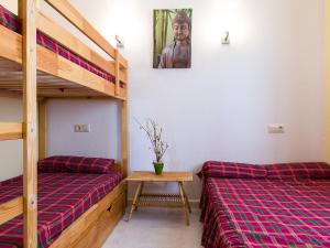 Ein Bett oder Betten in einem Zimmer der Unterkunft Apartment Vista Mar by Interhome