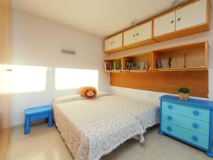 A bed or beds in a room at Holiday Home Vistamar by Interhome
