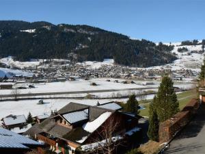 an aerial view of a town with snow covered roofs at Apartment Fabiana by Interhome in Zweisimmen