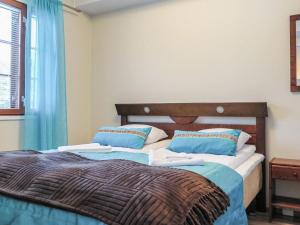 מיטה או מיטות בחדר ב-Holiday Home Alte levi calevi by Interhome