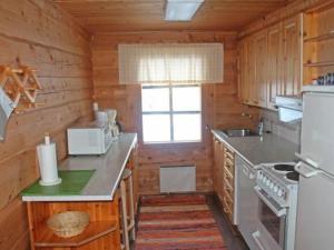 Kuchyň nebo kuchyňský kout v ubytování Holiday Home Hilla by Interhome