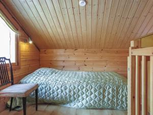Postel nebo postele na pokoji v ubytování Holiday Home Poronpurema a by Interhome