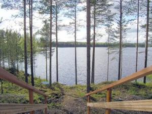 a view of a lake from the porch of a house at Holiday Home Syvälahti by Interhome in Sonkajärvi