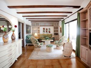 a large living room with chairs and a table at Villa Fanny by Interhome in Altea la Vieja