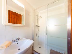 a bathroom with a sink and a shower at Apartment Melis-II - 7 by Interhome in Pals