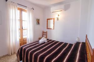 Posteľ alebo postele v izbe v ubytovaní Capuchinos 4 + 30 fotografií