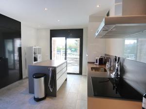 Kuchyňa alebo kuchynka v ubytovaní Holiday Home Gunella by Interhome