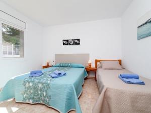 Postel nebo postele na pokoji v ubytování Villa Villa Sant Jordi by Interhome + 13 fotografií