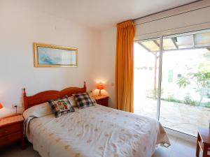 Postel nebo postele na pokoji v ubytování Holiday Home Montalt VIII by Interhome