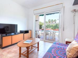 A television and/or entertainment centre at Holiday Home Villa Santa Marta II by Interhome