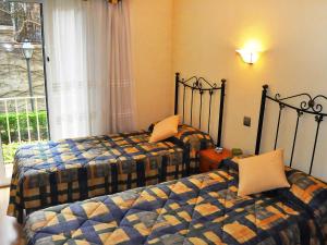 Postel nebo postele na pokoji v ubytování Apartment Buenos Aires by Interhome