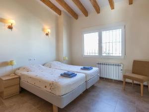 Łóżko lub łóżka w pokoju w obiekcie Villa Casa Salvador by Interhome