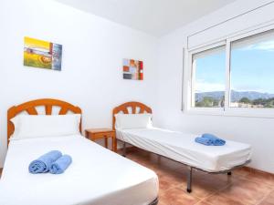 Posteľ alebo postele v izbe v ubytovaní Holiday Home Villa Santa Marta I by Interhome + 13 fotografií