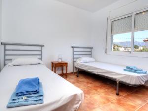 A bed or beds in a room at Holiday Home Villa Santa Marta II by Interhome