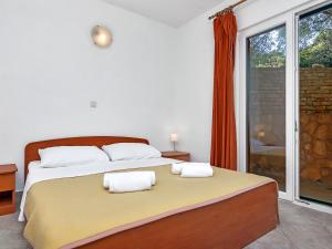 Posteľ alebo postele v izbe v ubytovaní Apartment Rubin-1 by Interhome