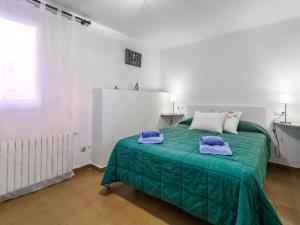A bed or beds in a room at Holiday Home Platja by Interhome