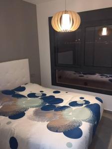 A bed or beds in a room at Penthouse Lamar 43.11