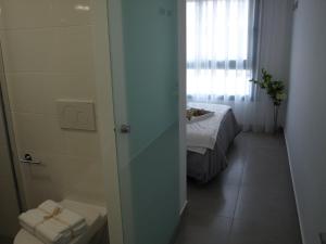 A bed or beds in a room at Penthouse Lamar 43.11 Még 9 kép