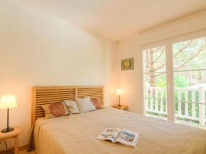 Katil atau katil-katil dalam bilik di Holiday Home Eden Club by Interhome