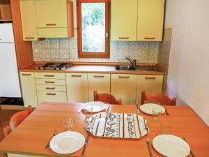 مطبخ أو مطبخ صغير في Apartment Marina Di Pinarello.26