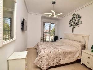Ένα ή περισσότερα κρεβάτια σε δωμάτιο στο Apartment Jardines del Montgo-2 by Interhome +14 φωτογραφίες