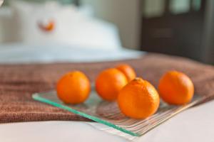 Postel nebo postele na pokoji v ubytování Aura Hotel Brooklyn