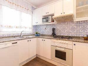 A kitchen or kitchenette at Apartment DMS IV-3 by Interhome