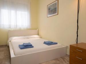 Postel nebo postele na pokoji v ubytování Apartment Vila Olímpica- Sant Martí - Sardenya by Interhome