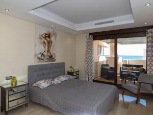 Ένα ή περισσότερα κρεβάτια σε δωμάτιο στο Apartment Bahia de la Plata by Interhome