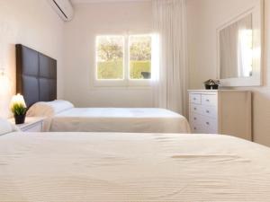 Posteľ alebo postele v izbe v ubytovaní Holiday Home El Dorada Playa by Interhome