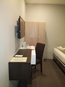 Postel nebo postele na pokoji v ubytování Hotel Costa Brava