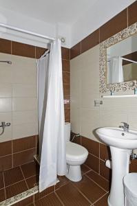 Koupelna v ubytování Hotel Paris