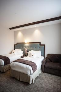 Postel nebo postele na pokoji v ubytování Aura Hotel Brooklyn